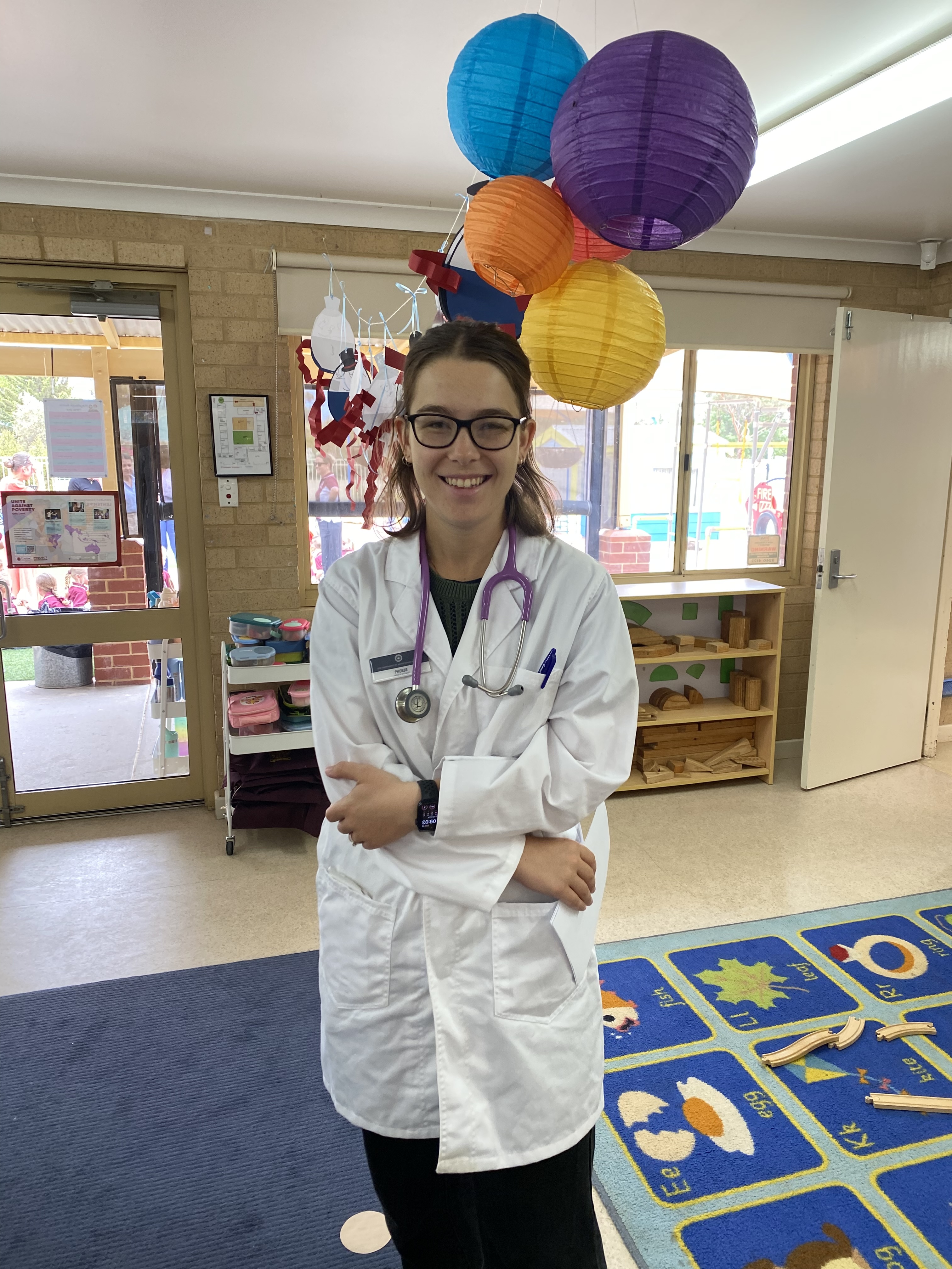 Phoebe in her doctor's coat
